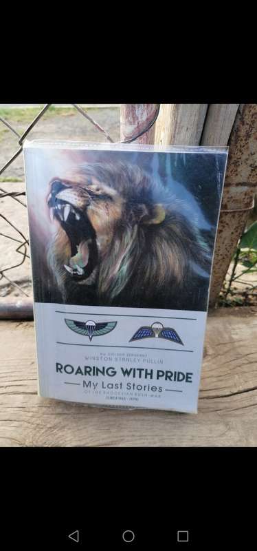 Winston Stanley pullin signed copy of the book ROARING WITH PRIDE