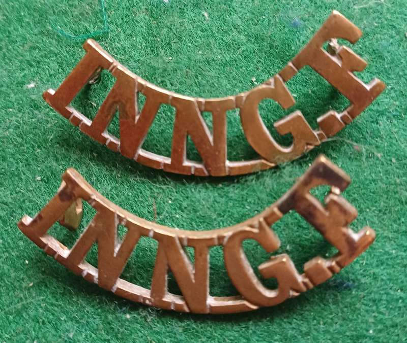 British Army Royal Inniskilling Fusiliers brass titles pair, D lugs