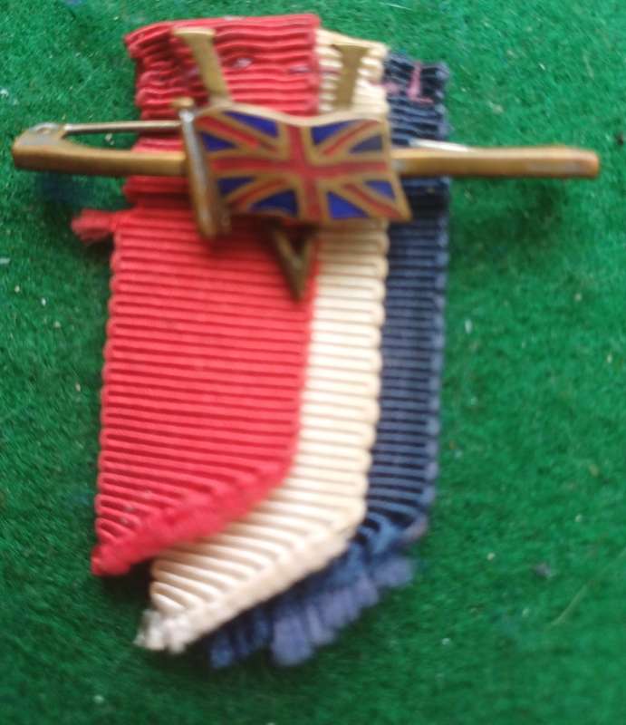 British WWII V for victory badge with Union Jack and Red, White & Blue ribbons.
