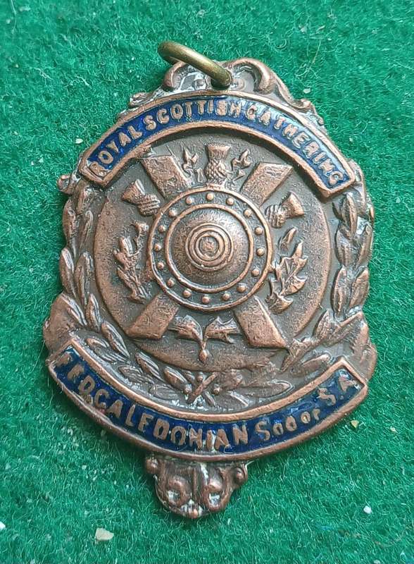 SA Caledonian Society Athletics medal, 1950, bronze & enamel. Interesting curio
