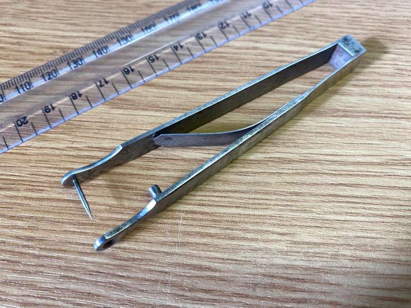 Antique ear piercing tool