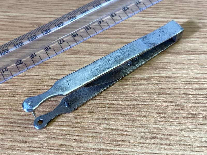 Antique ear piercing tool
