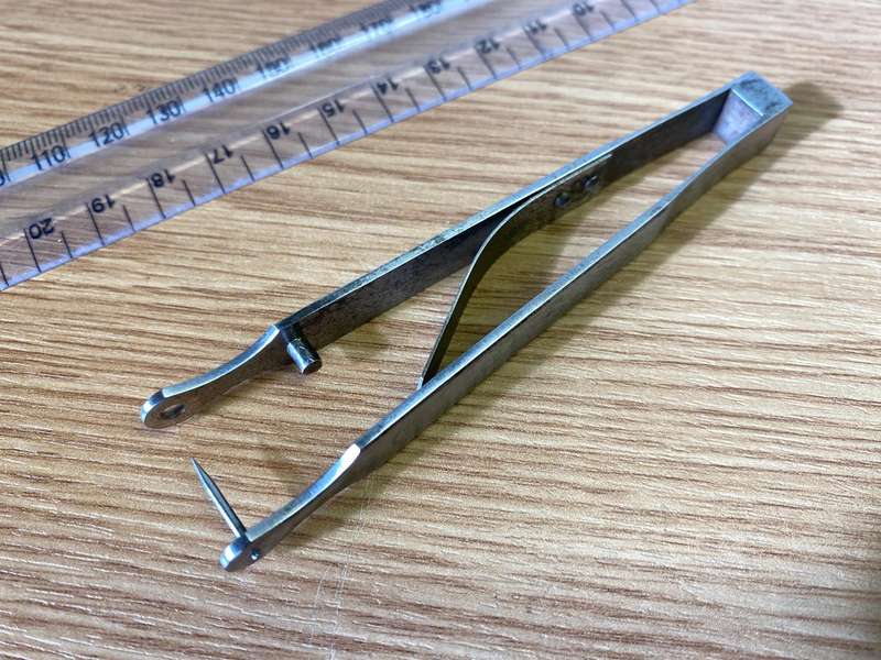 Antique ear piercing tool