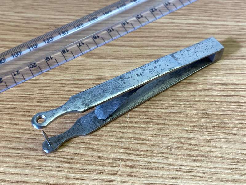 Antique ear piercing tool
