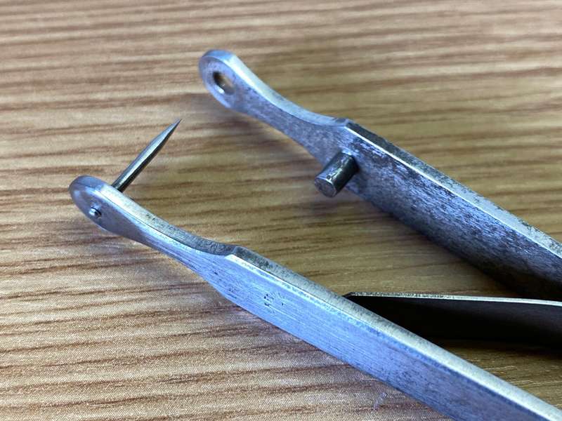 Antique ear piercing tool