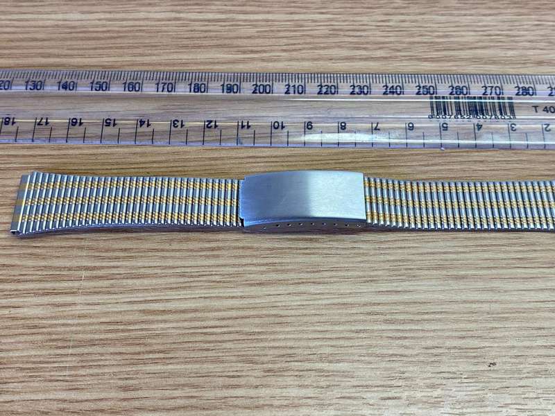 18mm stainless steel bracelet with gold accents