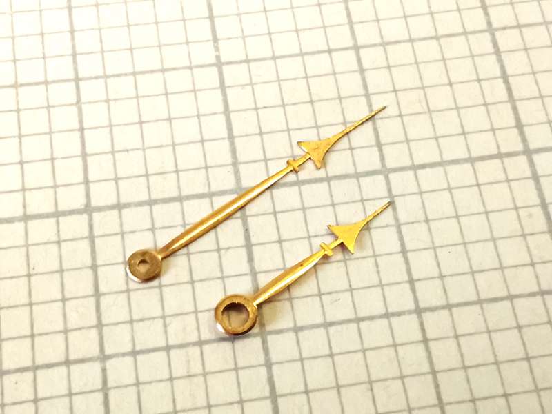 Gilt pocket watch hands