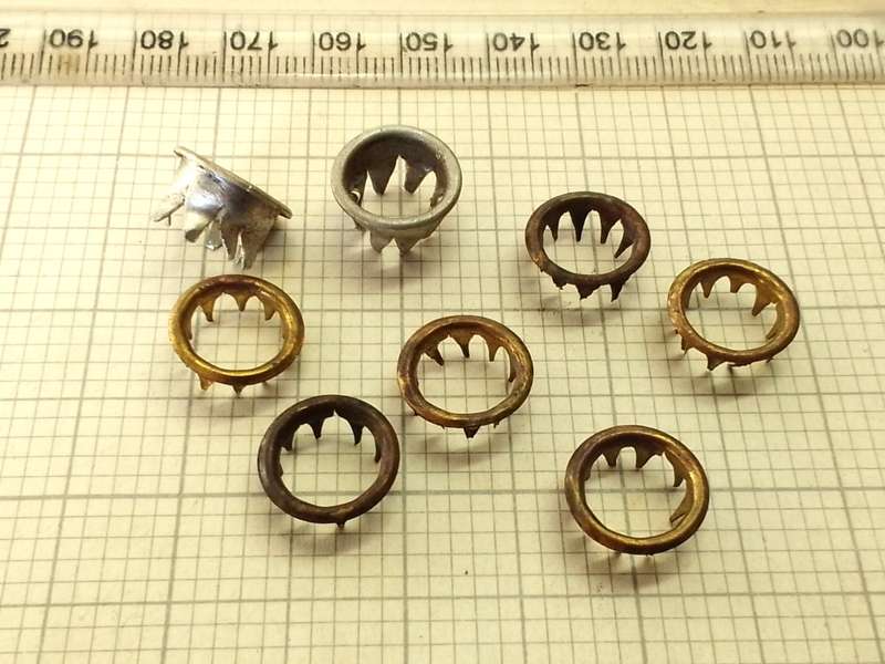Grommets for clock key winders
