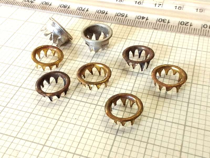 Grommets for clock key winders