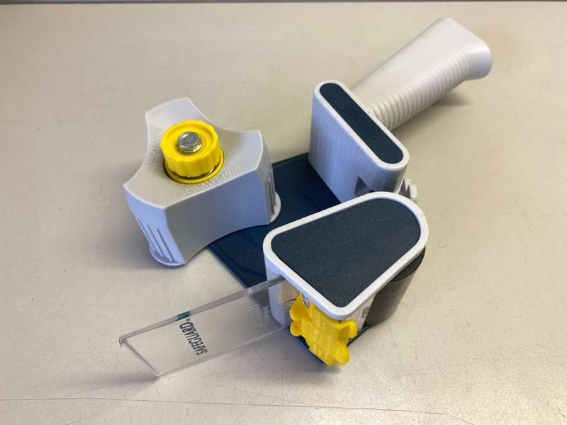Packaging tape dispenser