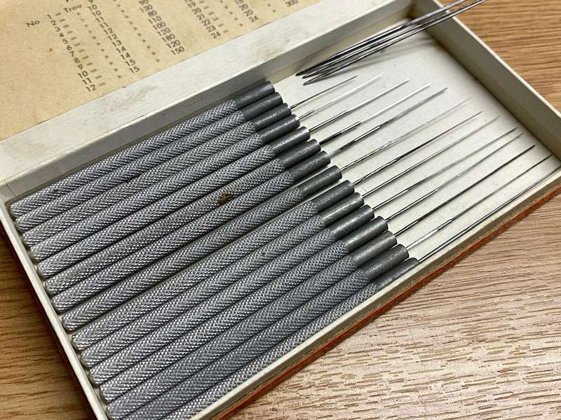 Watchmakers/jewelers cutting & smoothing broaches