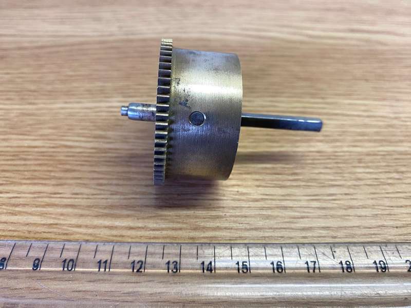 Clock mainspring barrels with spring