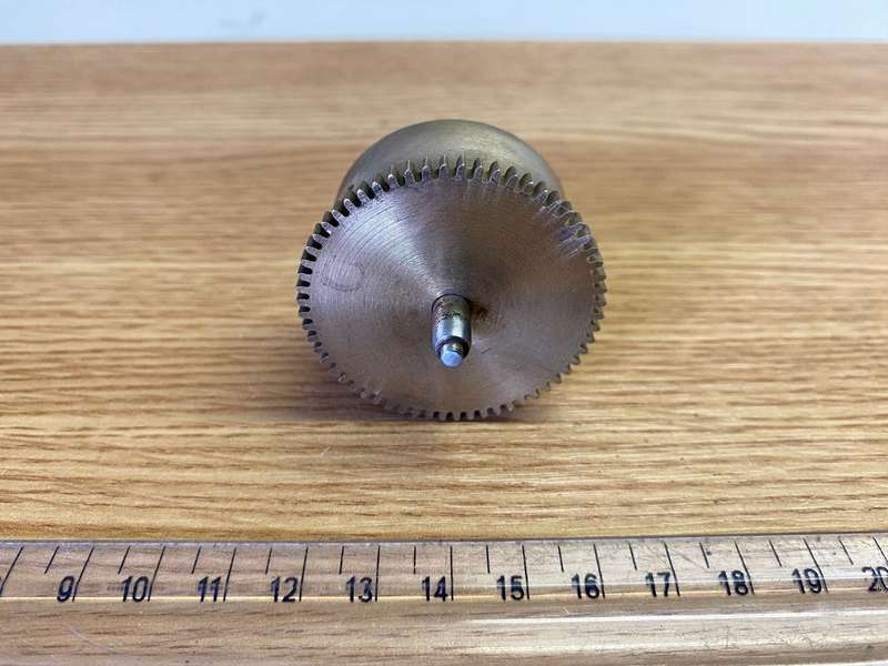 Clock mainspring barrels with spring