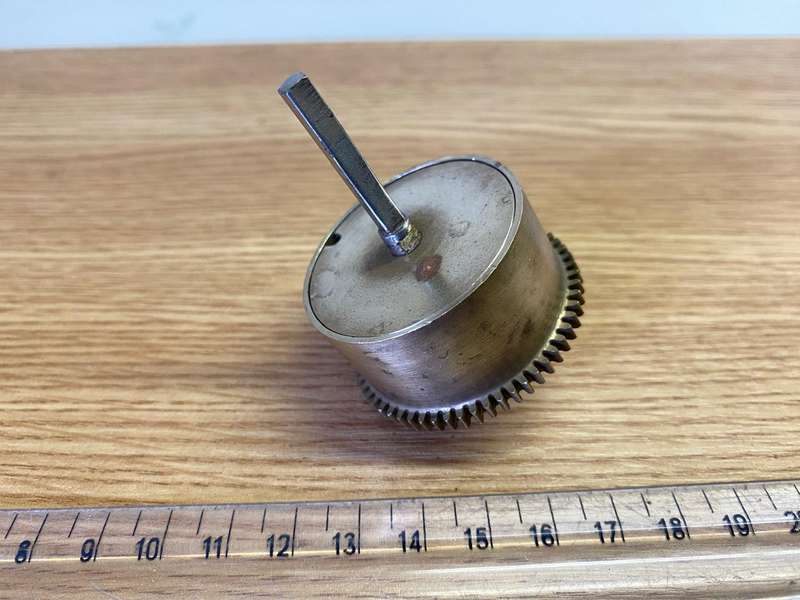 Clock mainspring barrels with spring
