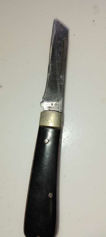 An ANTIQUE RODGERS AND SHEFFIELD COLLAPSABLE PENKNIFE / POCKET KNIFE.