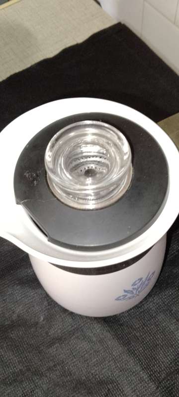 A  corning ware stove top espresso coffee pot