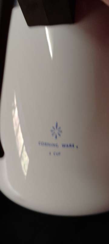 A  corning ware stove top espresso coffee pot