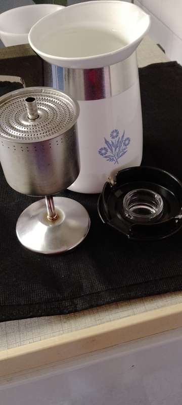 A  corning ware stove top espresso coffee pot