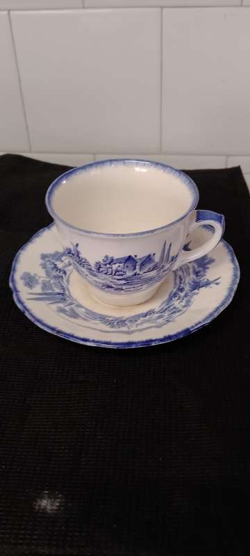 Antique Royal Doulton Norfolk Breakfast tea cup duo.