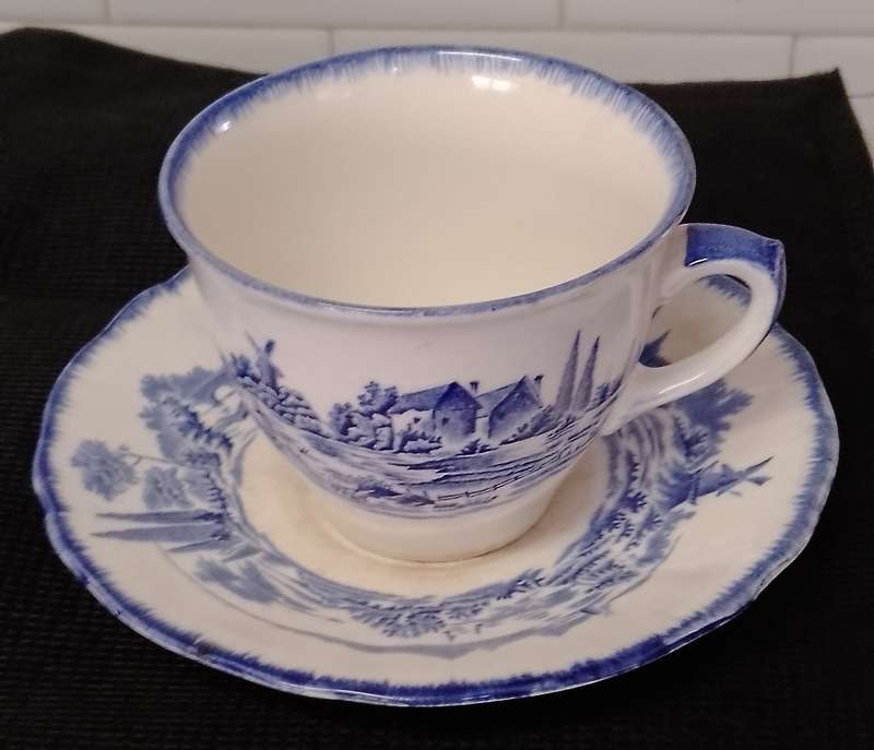 Antique Royal Doulton Norfolk Breakfast tea cup duo.