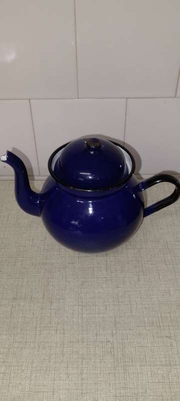 Vintage royal blue enamel teapot made in Poland.