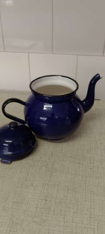 Vintage royal blue enamel teapot made in Poland.