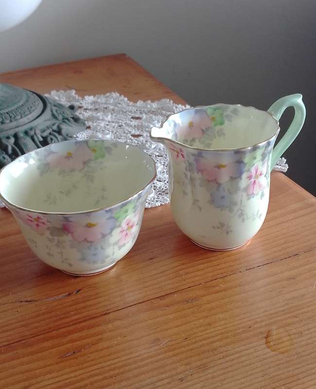 *#A VINTAGE CROWN STAFFORDSHIRE SUGAR AND CREAM SET.