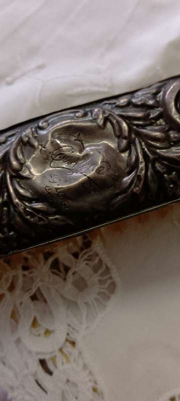 Antique silver handled clothes brush  16cm long