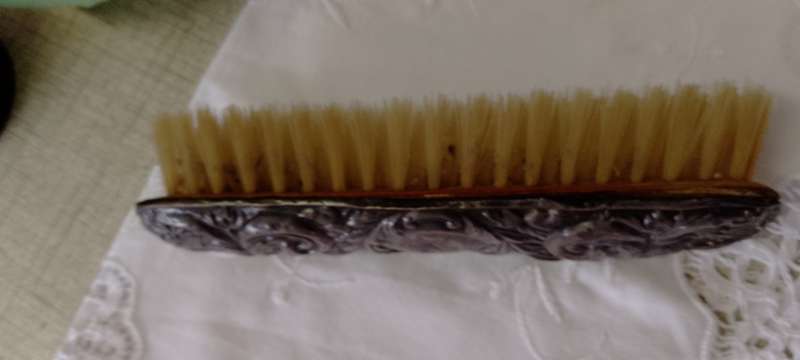 Antique silver handled clothes brush  16cm long