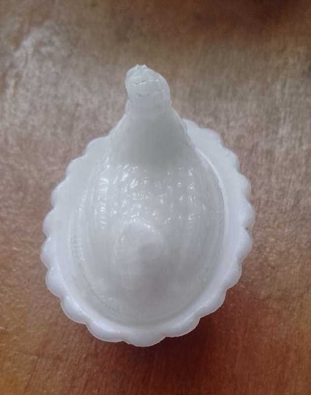 A VINTAGE MINATURE MILK GLASS CHICKEN NEST