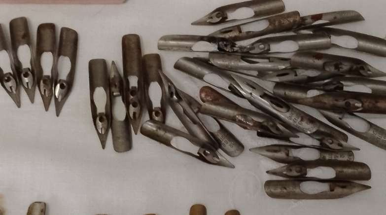 An ASSORTED ANTIQUE INK DIP PEN NIBS