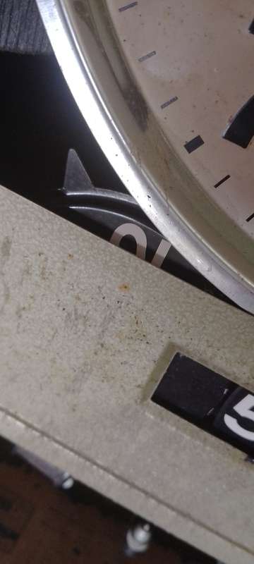 A vintage Seiko wall chiming clock. For parts only. Not working front cover missing.