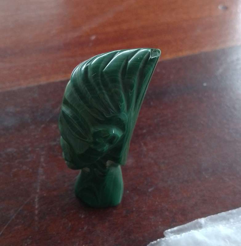 A Malachite "talking head" 7cm tall base 1.5cm across