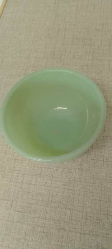 A Vintage Jade green Fire King Bowl