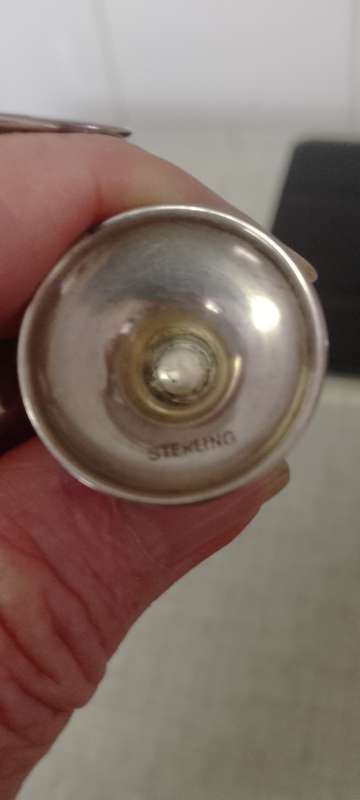 A pair of Sterling salt and pepper shakers 5cm tall base 2.5cm