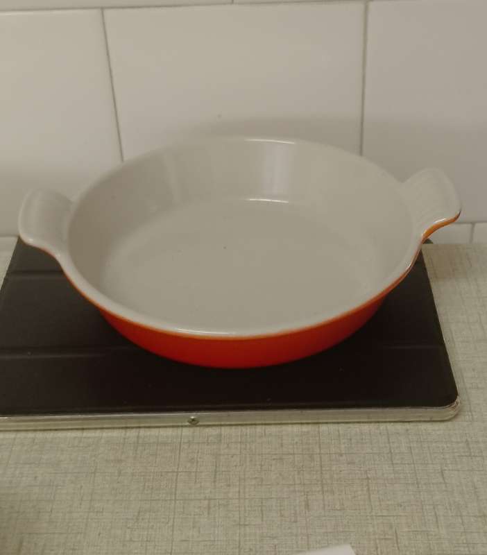 A vintage burnt orange no.18 cast iron enamel Cousances France