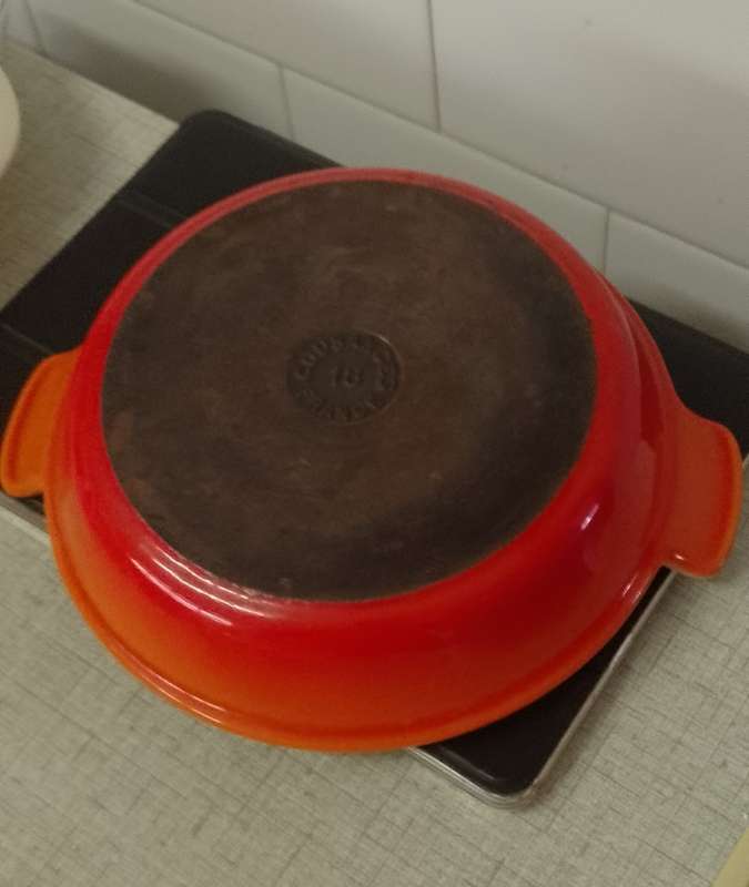 A vintage burnt orange no.18 cast iron enamel Cousances France