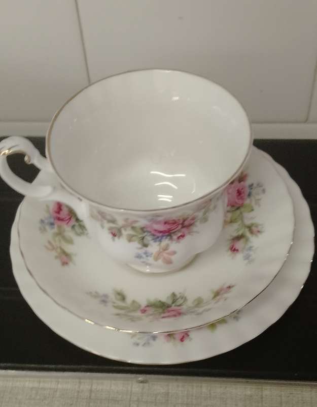 A vintage Royal Albert Moss Rose trio. Cup and saucer