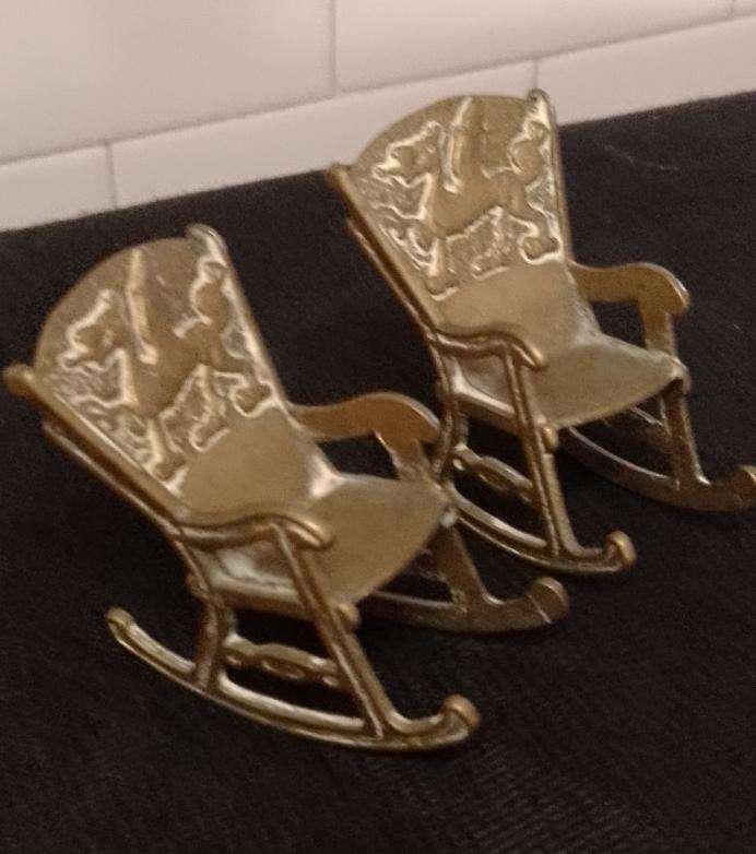A Pair of antique Brass Chinese Dragon motive miniature rocking chairs.