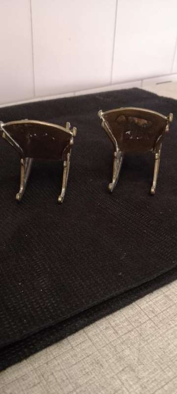 A Pair of antique Brass Chinese Dragon motive miniature rocking chairs.