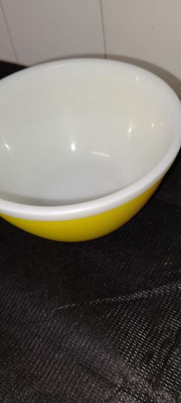 A Vintage yellow JAJ no.702 milk glass mixing bowl.