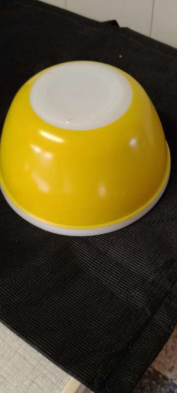 A Vintage yellow JAJ no.702 milk glass mixing bowl.