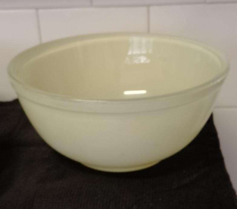 A well used Vintage glass JAJ no.305: pale lemon on outside.