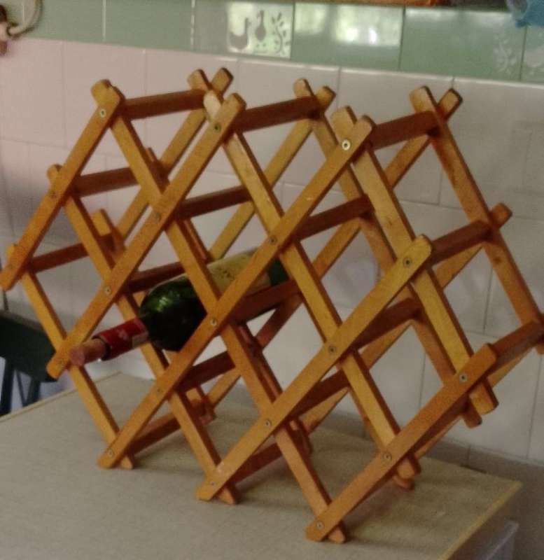 A wooden wine rack (bottle not included)