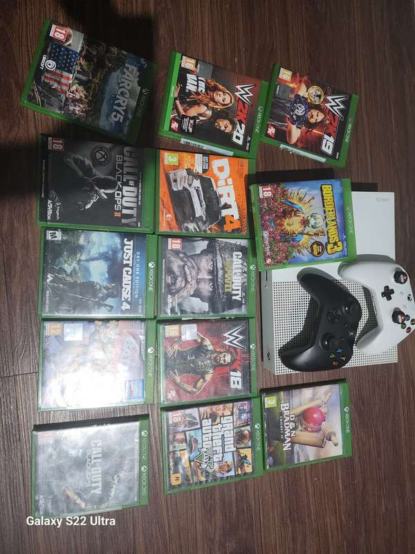 Xbox one s in great condition  with 2 controls and 3 games of your choice