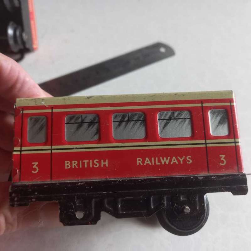 Vintage tin plate clockwork train. Please see