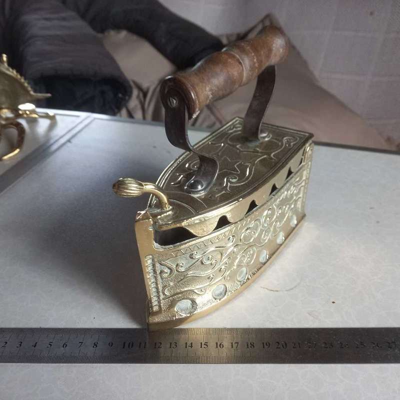 Vintage brass coal iron..quality item