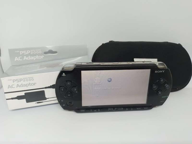 PSP 1000,  Charger, Carry Case, no memory Card
