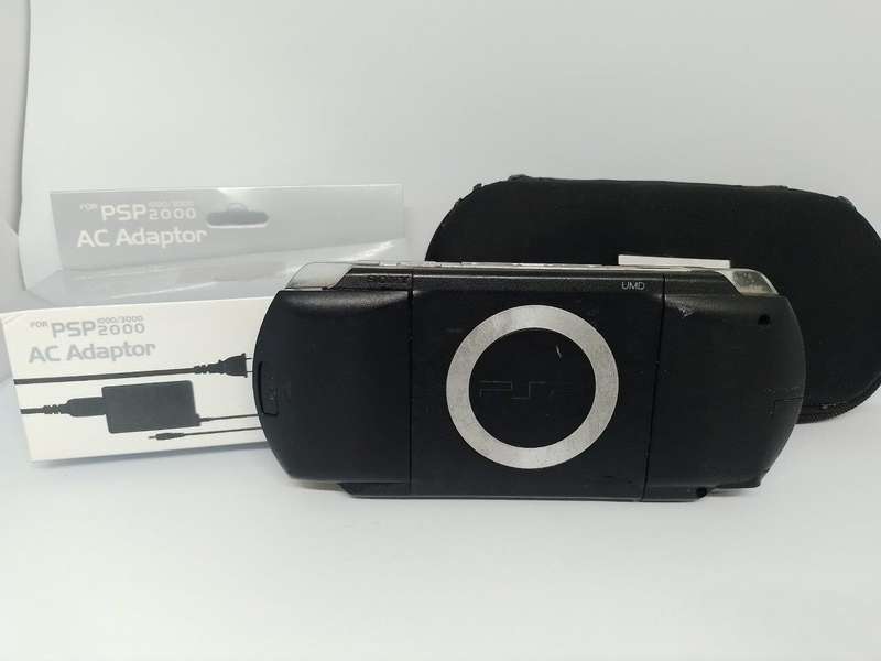 PSP 1000,  Charger, Carry Case, no memory Card