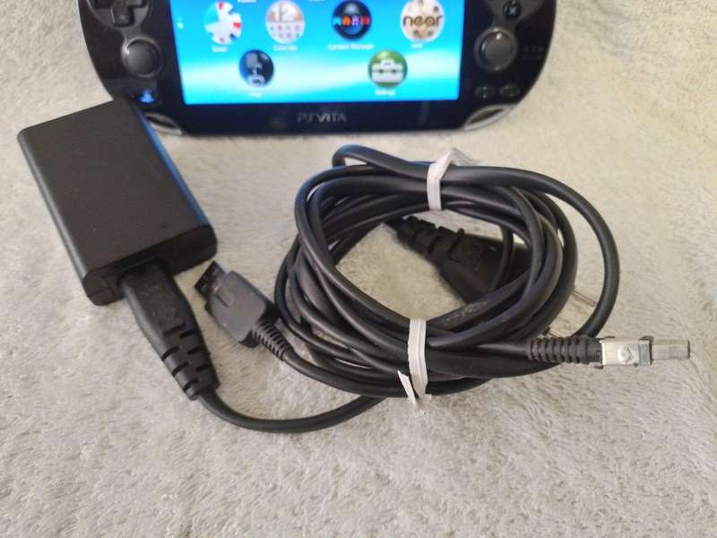 Sony PSVITA 1000 c/w Generic Charger
